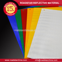 Commercial grade reflective sheeting for temporary warning signs